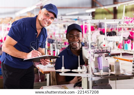 portrait of textile factory manager and worker