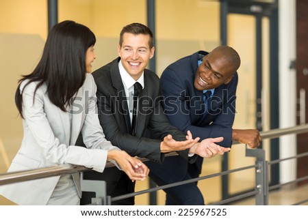 businessman having fun conversation with colleagues during break