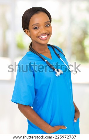 portrait of pretty african medical nurse in hospital