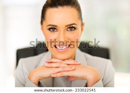 gorgeous office worker sitting in modern office