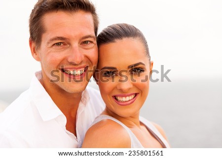 attractive young couple on cruise ship closeup portrait