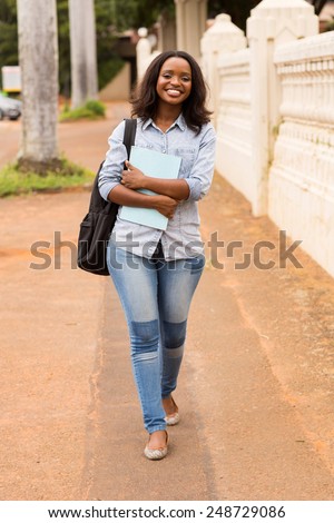 happy african college girl going to school