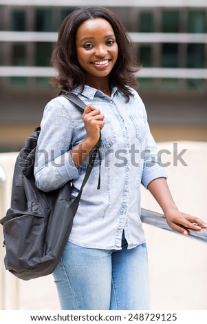 beautiful african american female college student with backpack
