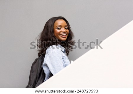 happy female african college girl on campus