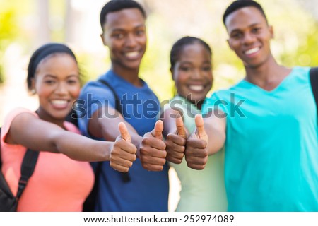 group of african college friends thumbs up