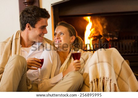 beautiful couple spend romantic evening drinking wine