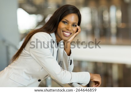 gorgeous afro american career woman looking at the camera