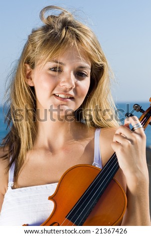 happy young caucasian violin player
