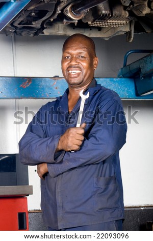 happy african mechanic portrait