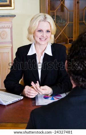 female consultant at work with her client