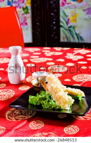 sushi tempura on red table