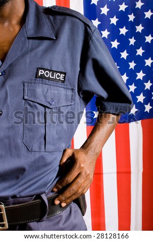 police officer, background is american flag