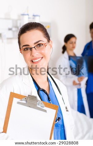 smiling female beautiful doctor in hospital