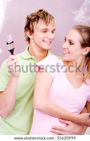 couple painting home