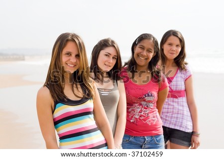 stock photo group of teen girls on beach