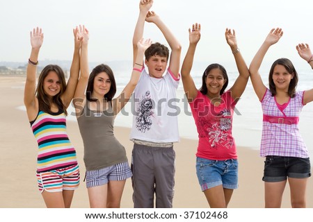 stock photo group of teens on beach