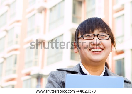 young happy chinese business woman