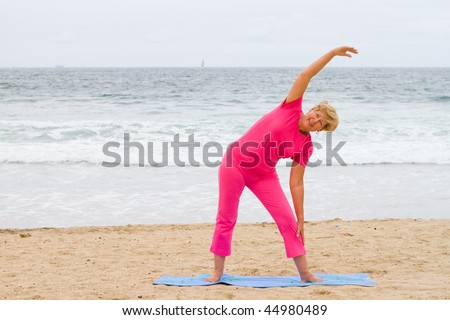 elderly woman doing fitness working out