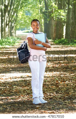 beautiful female African American college student on campus