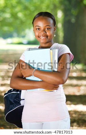 happy young african american college student on campus