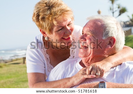 happy laughing senior couple