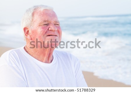 closeup of senior citizen man on beach