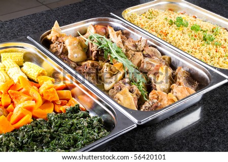 buffet style food in trays