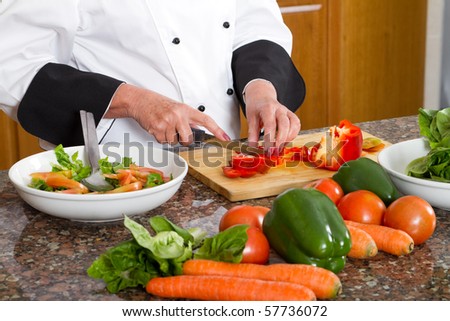 professional chef making salad
