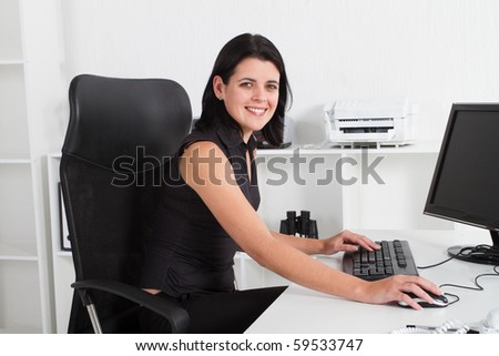 attractive businesswoman in office