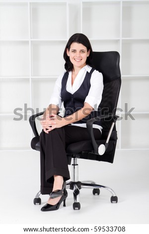businesswoman sitting on office chair
