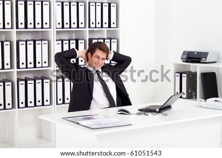 relaxed businessman in office