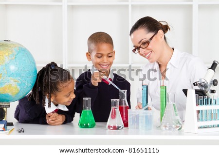 science teacher and students in lab