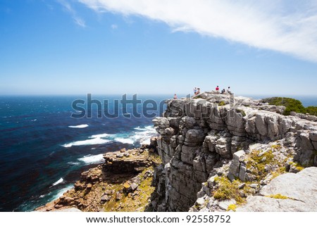 tourists on cape of good hope, south africa