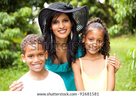 beautiful indian mother and kids portrait outdoors