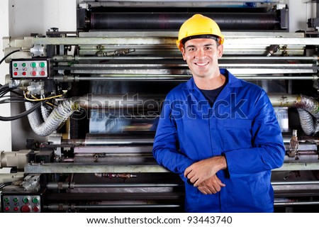 portrait of modern printing press operator in factory