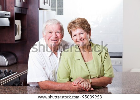 happy loving senior couple portrait at home