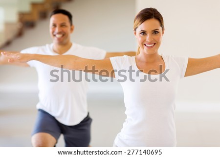 beautiful young woman doing body exercise