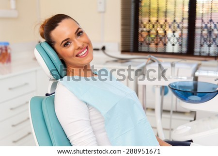 beautiful female patient in dental practice