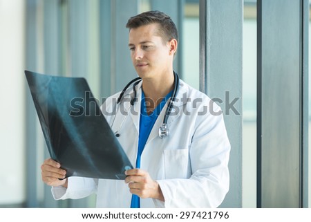 handsome medical worker working at hospital