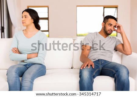 angry indian couple having conflict at home
