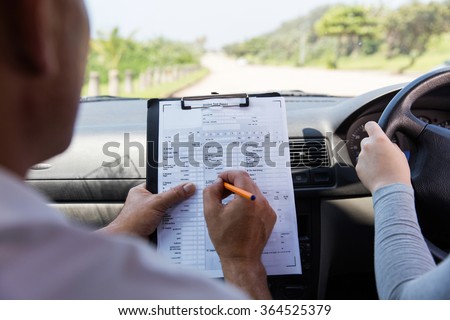 back view of girl taking driving test