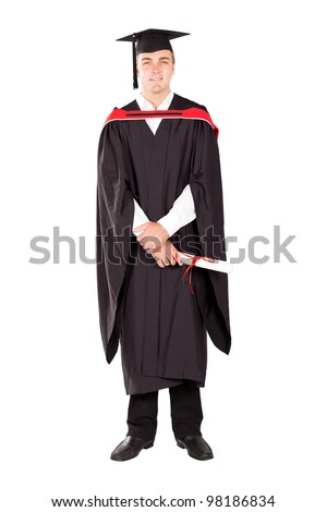 young male graduate in cap and gown full length isolated on white young male graduate in cap and gown full length isolated on white