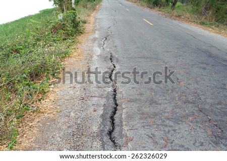 Crack of the old asphalt road on local side looks danger for road user