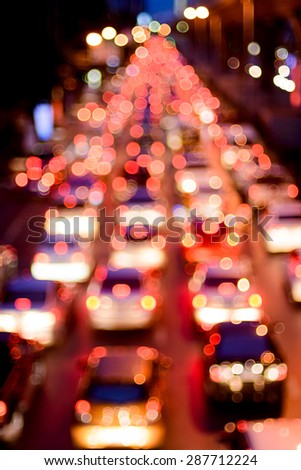 Out focus bokeh effect abstract. From car rear light on the road traffic jam in Bangkok Thailand.