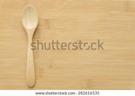 wood  spoon on wood background