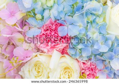 Floral arrangement, bouquet, with white, pink, White roses and purple hortensia, hydrangea, close up