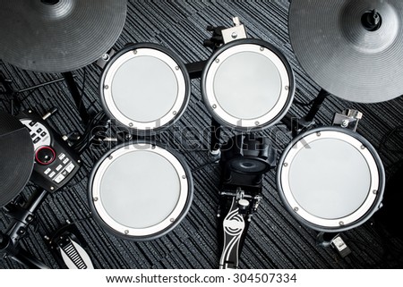 Top view of Electronic drum set in a small room