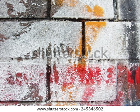 weathered graffiti spray paint brick wall