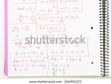 Written Equations/Math Problems on a Notebook