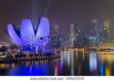 SINGAPORE, SINGAPORE - CIRCA SEPTEMBER 2015: Singapore city lights and ArtScience Museum at night, Singapore